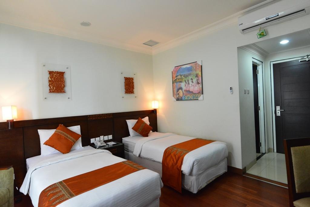 Amazing Kutaradja Hotel Jacarta Quarto foto